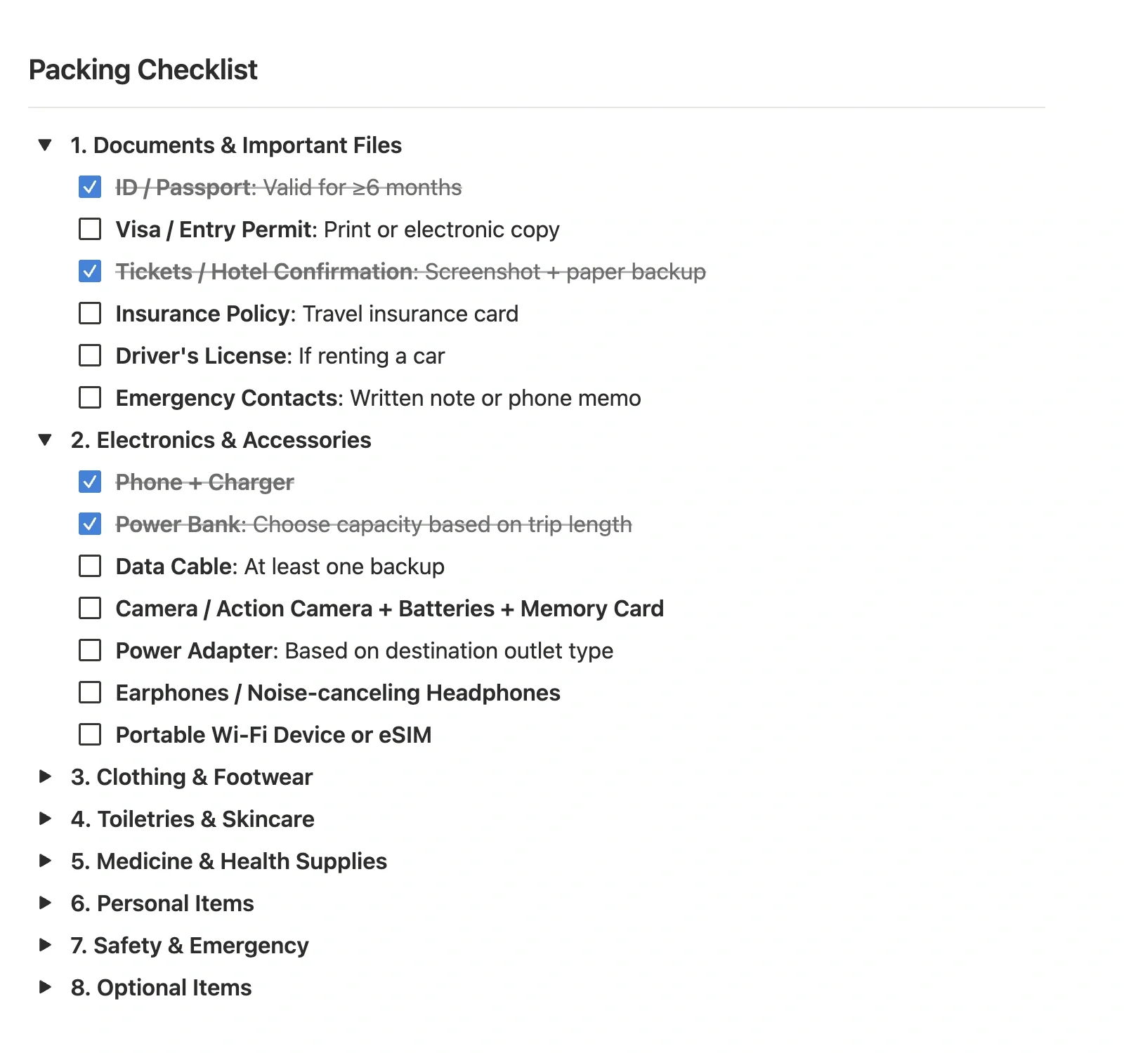 Packing list collapsed by category, with documents and electronics expanded and checked off item by item
